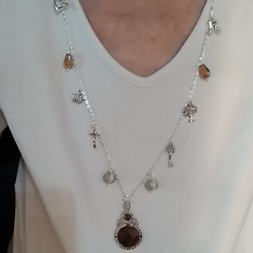 Necklace of brown beads and charms